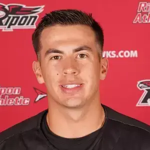 Young Jake Williams smiles for a headshot for the Ripon College baseball team
